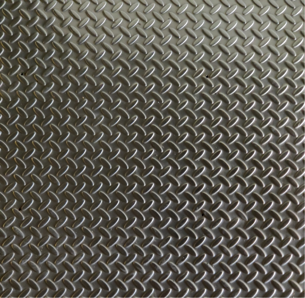 Closeup of a metal sheet.