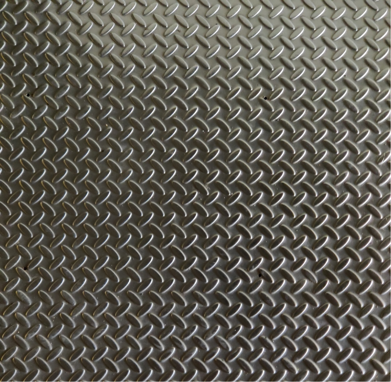 Closeup of a metal sheet.