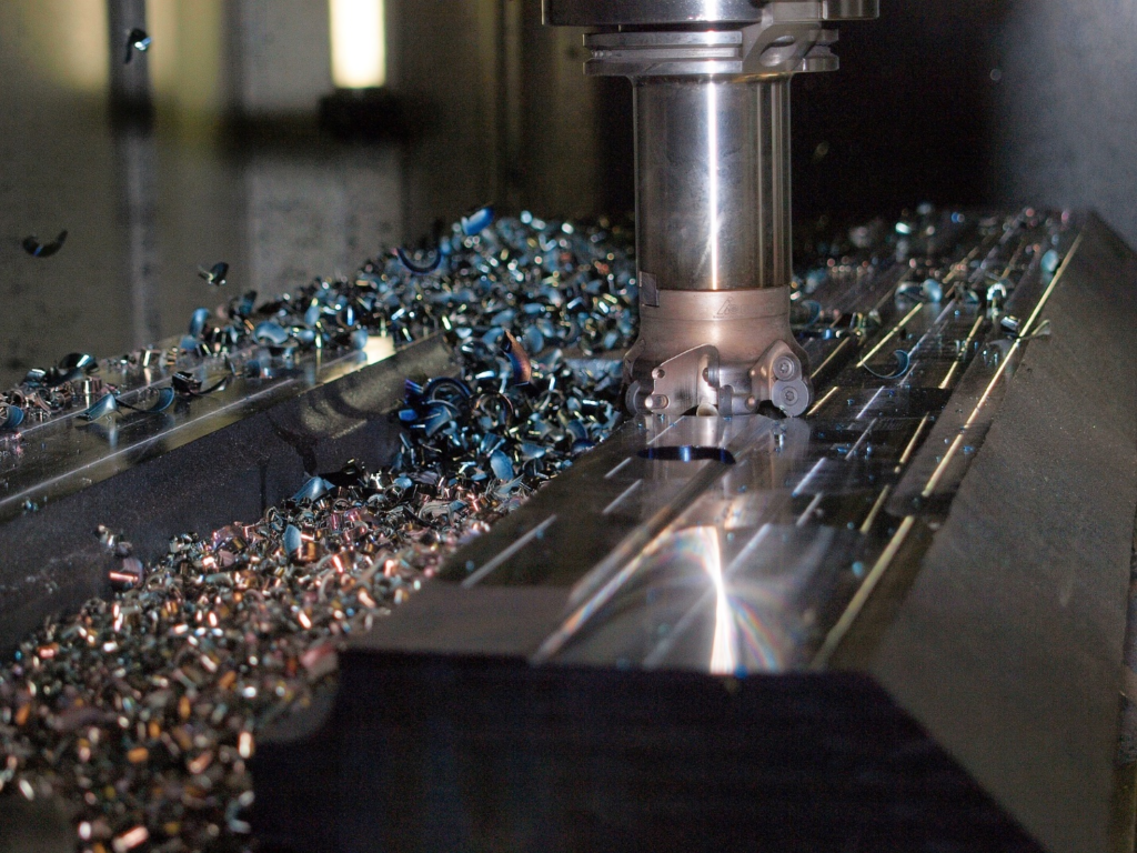 A CNC milling machine with its waste material.